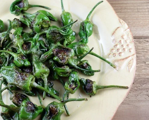 What is a recipe that uses Padron peppers?