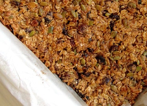 Chewy granola bars baked in the pan.