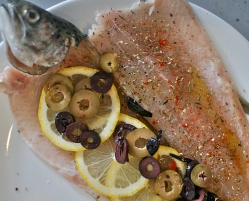 Trout stuffed with olives and lemon