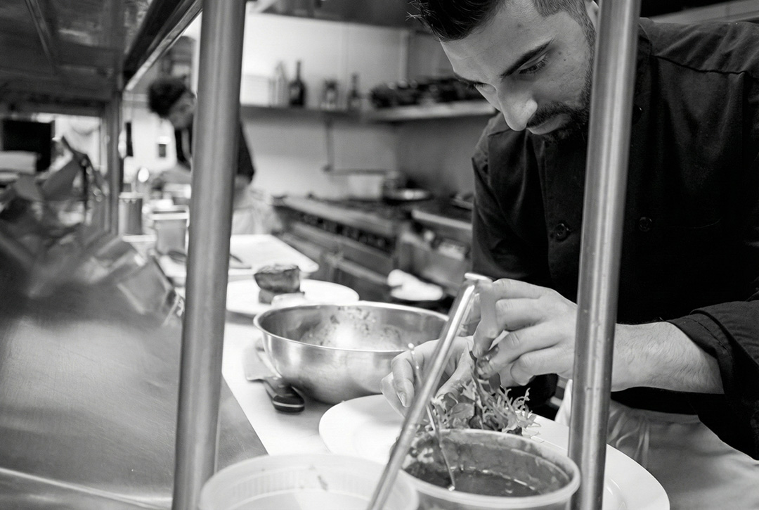 Line cook working in the kitchen