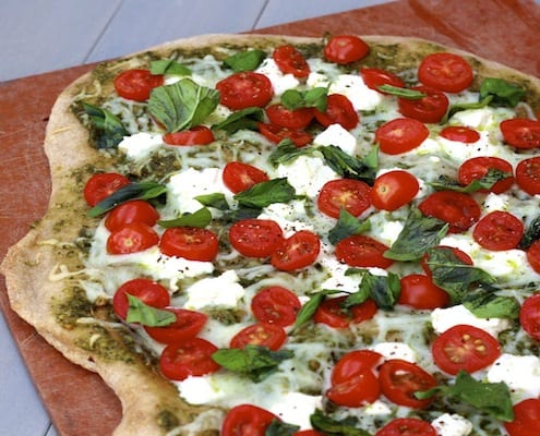 White Pesto Pizza with Tomatoes and Basil