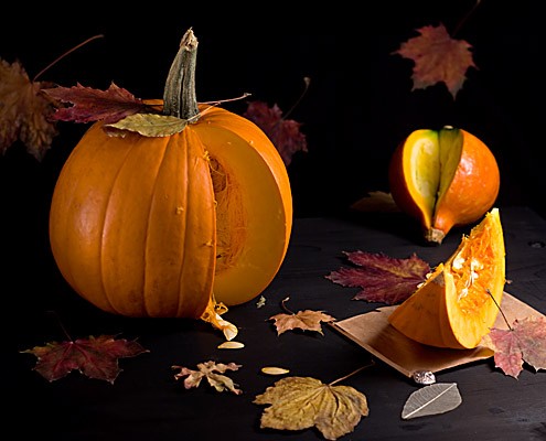 Raw  Pumpkin and Autumn Leaves