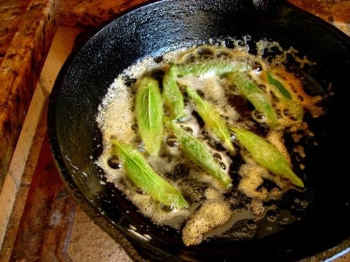 Sage leaves crisping in browned butter.