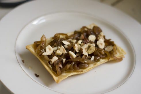 Mille-feuille base with caramelized onion and hazelnuts
