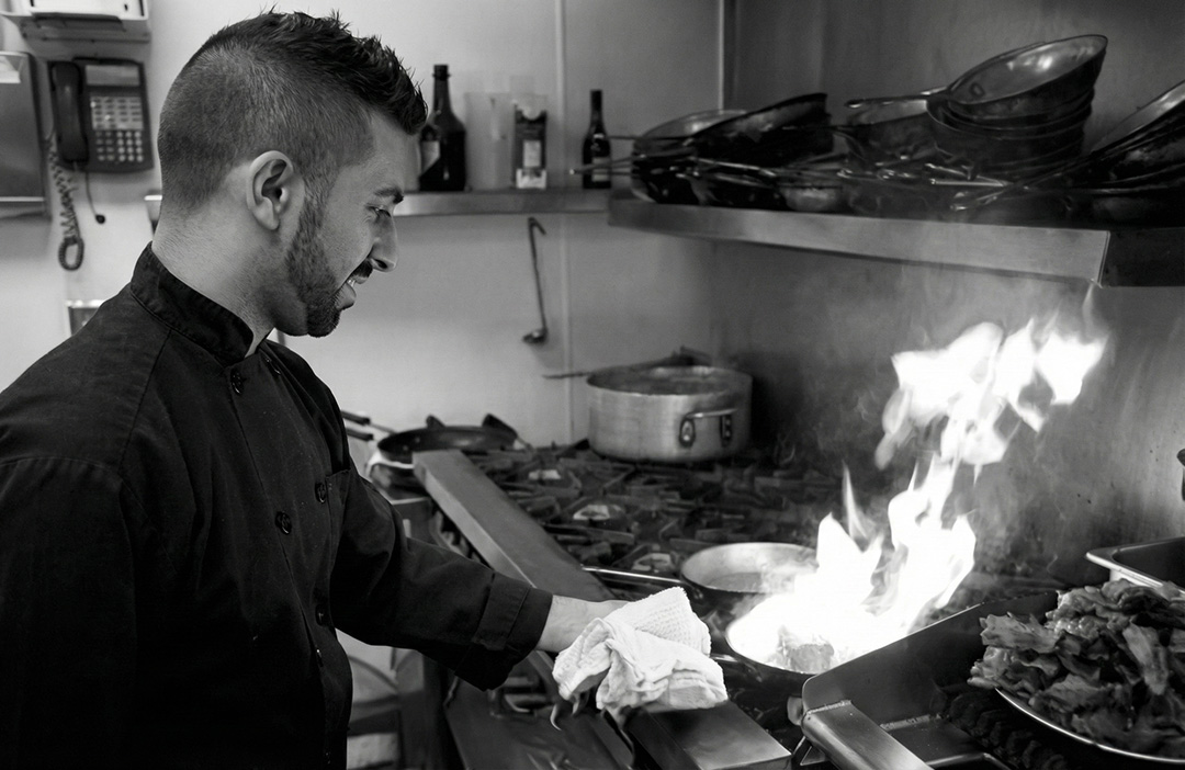 Line cook working in the kitchen