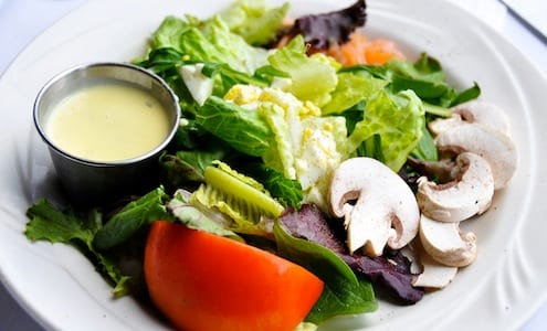 a simple salad with a mustardy dressing