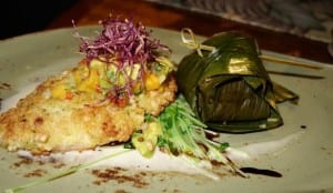 Fresh mahi mahi with jasmine rice in banana leaf