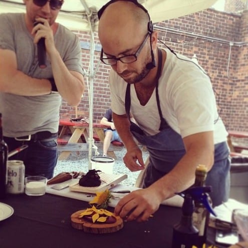 Brooklyn Chef Jose Ramirez shares his perspective on plant-based cuisine with a dish of charred beets, sunflower praline, goats milk/cheese, spruce vinegar & sunflower petals at Omnivore World Tour 2013.