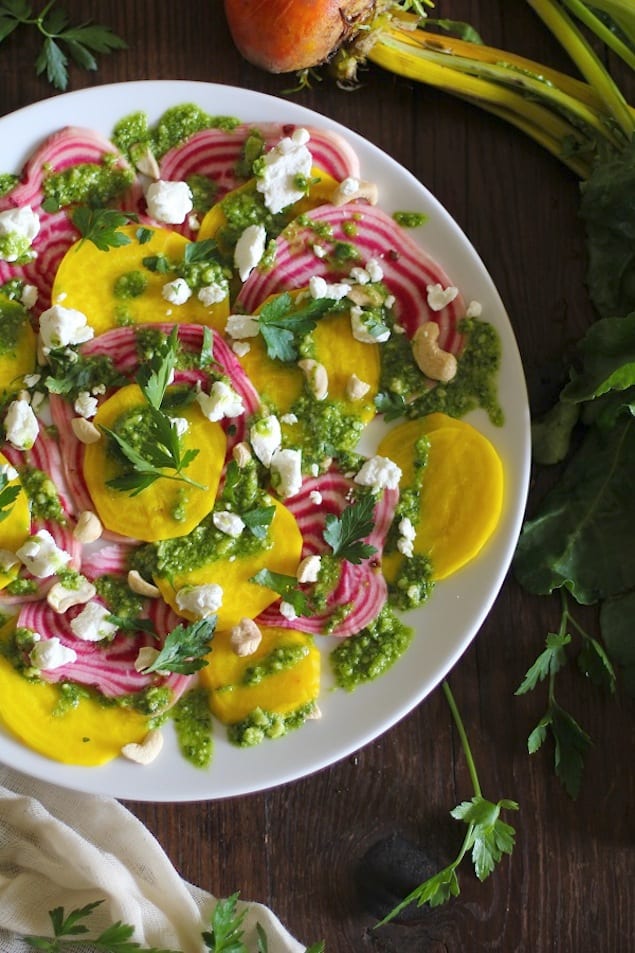 sliced_chioggia_beet_salad_with_parsley_pesto_and_goat_cheese_hero