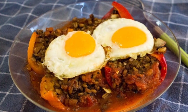 Red peppers with freekeh, topped with fried eggs