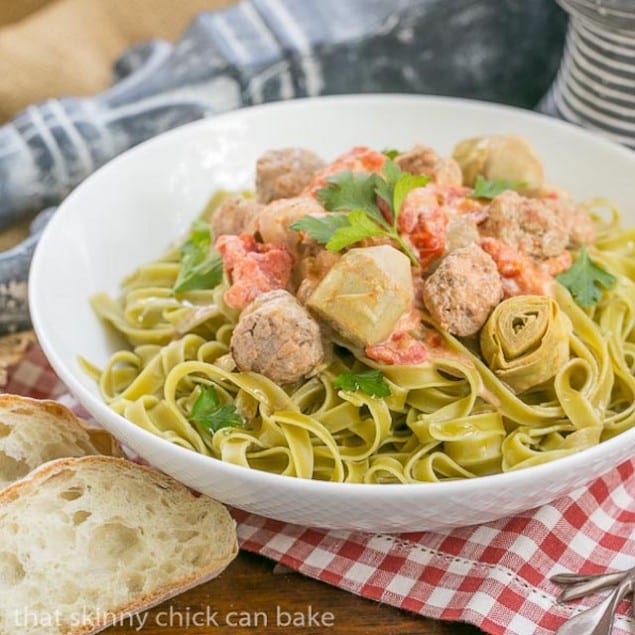 Italian Holiday Table: Creamy Sausage Pasta and Chocolate Layer Cheesecake