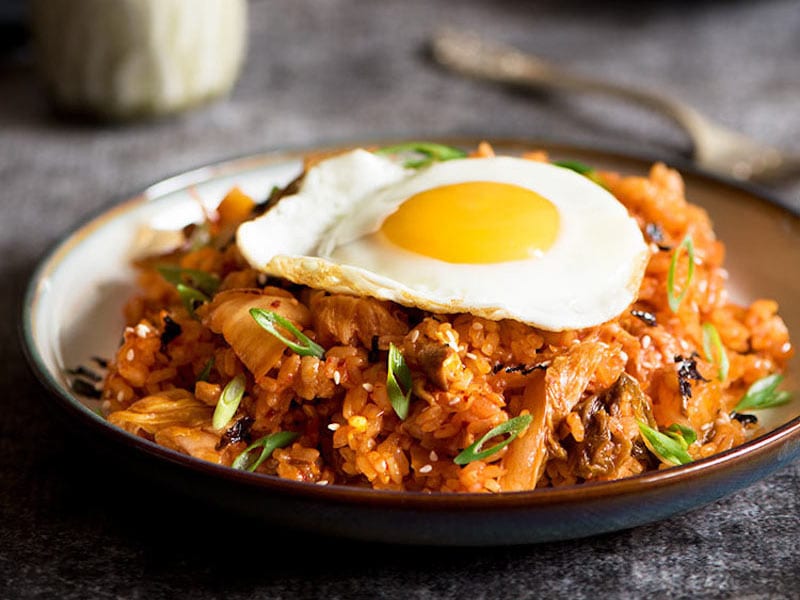 Premium Photo  Fried rice with pork and fried egg in japanese