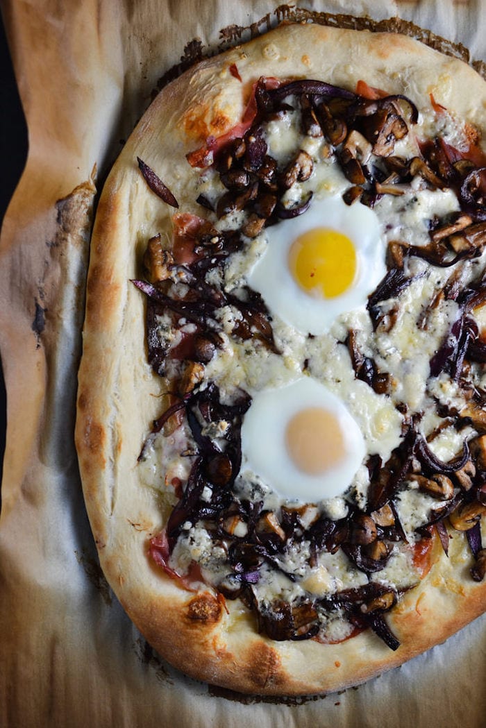 Gorgonzola, Caramelized Onion, and Prosciutto Pizza with an Egg