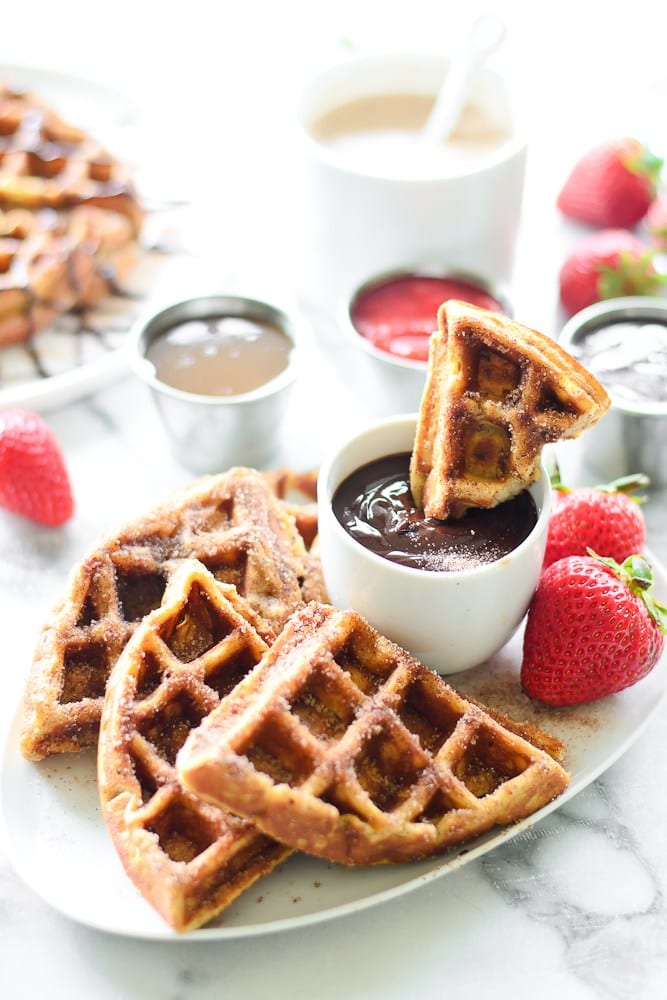 Churro Waffles with Caramel, Chocolate, and Strawberry Sauces