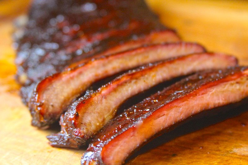 sliced ribs on cutting board