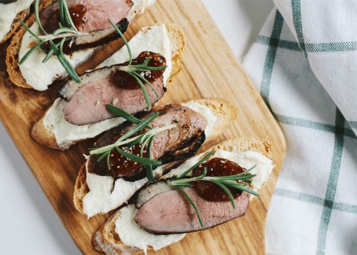 Parsnips Puree, Fig Jam and Duck Confit Crostini with Pinot Noir Wine