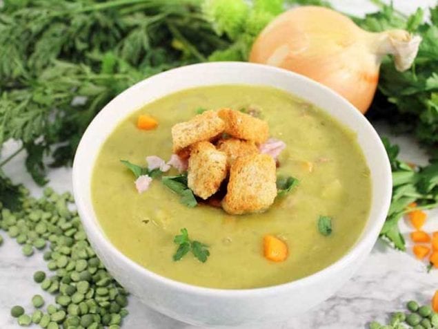 This Split Pea Soup is a warming soup that can be on the dinner table in 30 minutes, thanks to your pressure cooker or Instant Pot. It has a rich split pea base with a wonderful smoked ham flavor running through it.