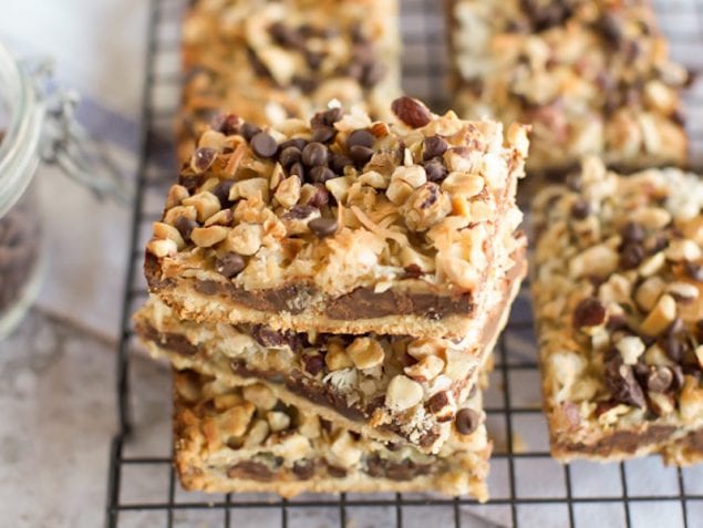 These Gluten Free Seven Layers Bars are a perfect dessert for any occasion. They are packed with layers of chocolate, coconut flakes, and pecans.