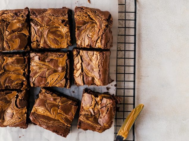 Make a batch of these fudgy peanut butter swirl brownies stuffed with peanut butter cups. So, so delicious.