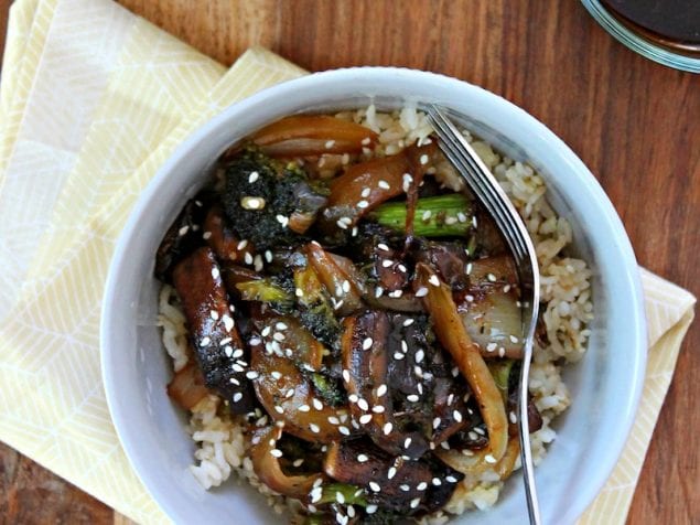 These meatless Teriyaki Mushroom Bowls are sweet and salty with a homemade teriyaki glaze to coat the hearty portobellos, caramelized onions and broccoli, served over rice or noodles. Faster than takeout, these mushroom bowls take no time at all to prepare