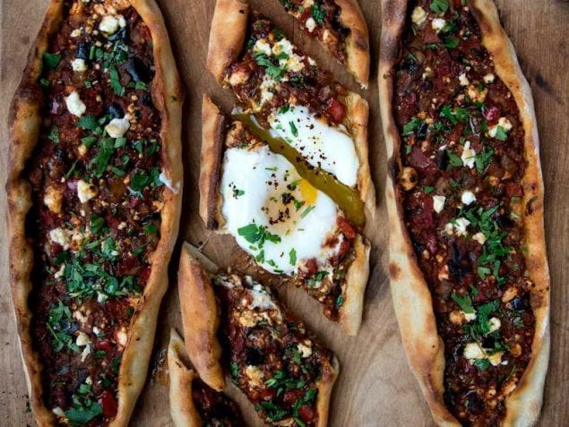 Pide is a Turkish flatbread formed into a boat-like shape. It’s addictively good, anytime of the day — breakfast, lunch or dinner. Check out this vegetarian version made with eggplant and more.