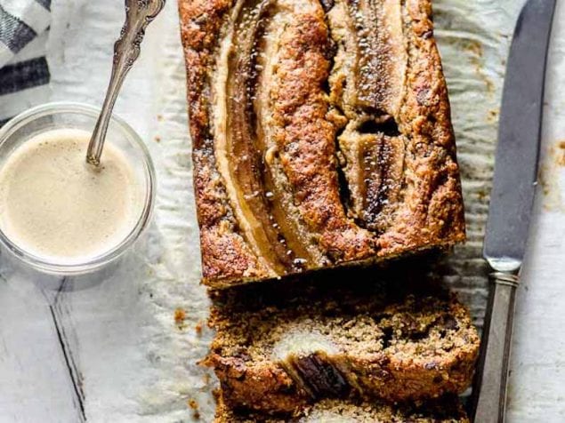 Once you try this super easy, fool proof vegan banana bread, you won’t want to use any other recipe! Sweetened with maple syrup and bananas and mixed by hand, no need to dirty the mixer.