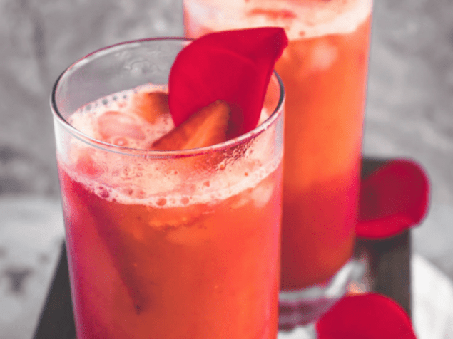 This Orange-Strawberry Spritzer is one gorgeous looking and tasting non-alcoholic party drink. A perfect spring sipper.