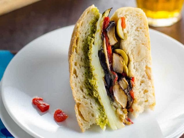 This wonderfully savory and flavorful vegetarian muffuletta sandwich swaps in 