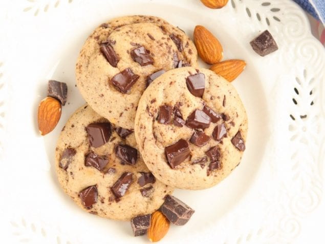 These almond butter cookies are the bomb. Ultra soft and chewy, sweetened with maple syrup, the nuttiness of almond butter, and loads of dark chocolate chunks.