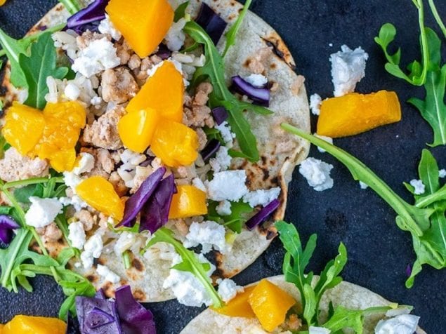 These Peach and Pork Tacos are a bright, light fusion blend of flavors and ingredients in a recipe that is quick and beautiful.