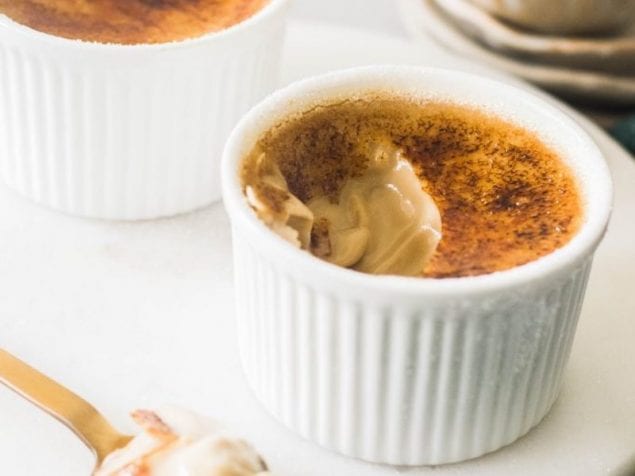 This Coffee Crème Brûlée is a silky smooth espresso flavored custard with the iconic crunchy caramelized sugar top. Decadence at its finest.