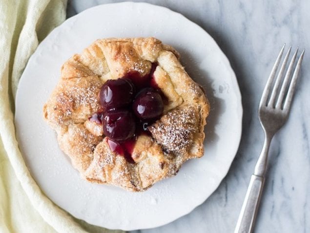 These Cream Cheese and Cherry Pastries are a sweet morning treat that is elegant and perfect to sit on the porch with on a warm morning and enjoy with a cup of coffee.