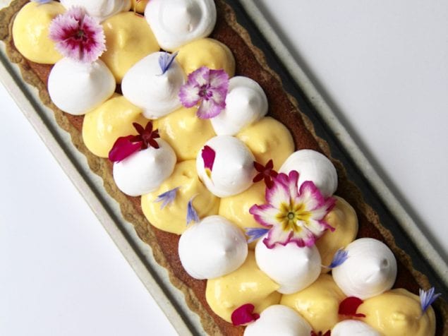 With beautiful piping, this matcha-lemon tart is first layered with an almond frangipane filling in a matcha tart dough and topped with lemon curd and meringue.