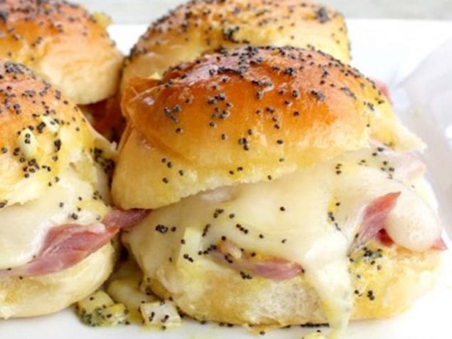 Easily make a big pan of these warm ham and cheese sliders for a brunch or picnic crowd.