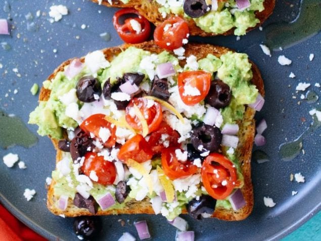 This Greek Avocado Toast is an open-faced sandwich made with iconic Greek ingredeints. It's time to take the hip toast to a new level of flavor.