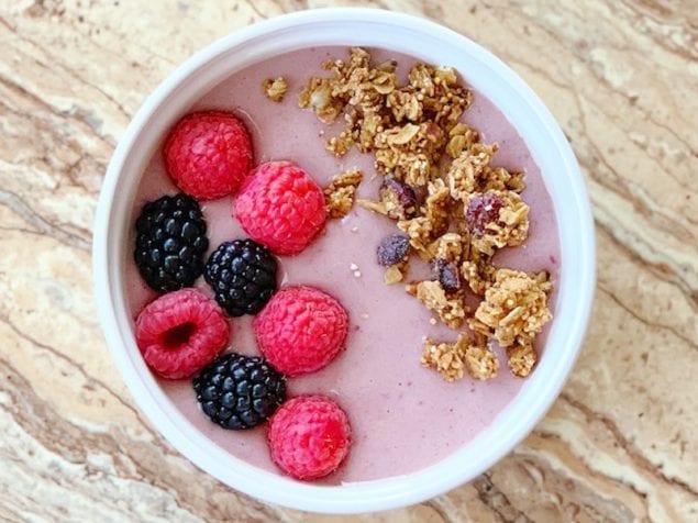 This smooth, cool berry smoothie bowl is filled with summer fruit and is sure to start your morning off right.