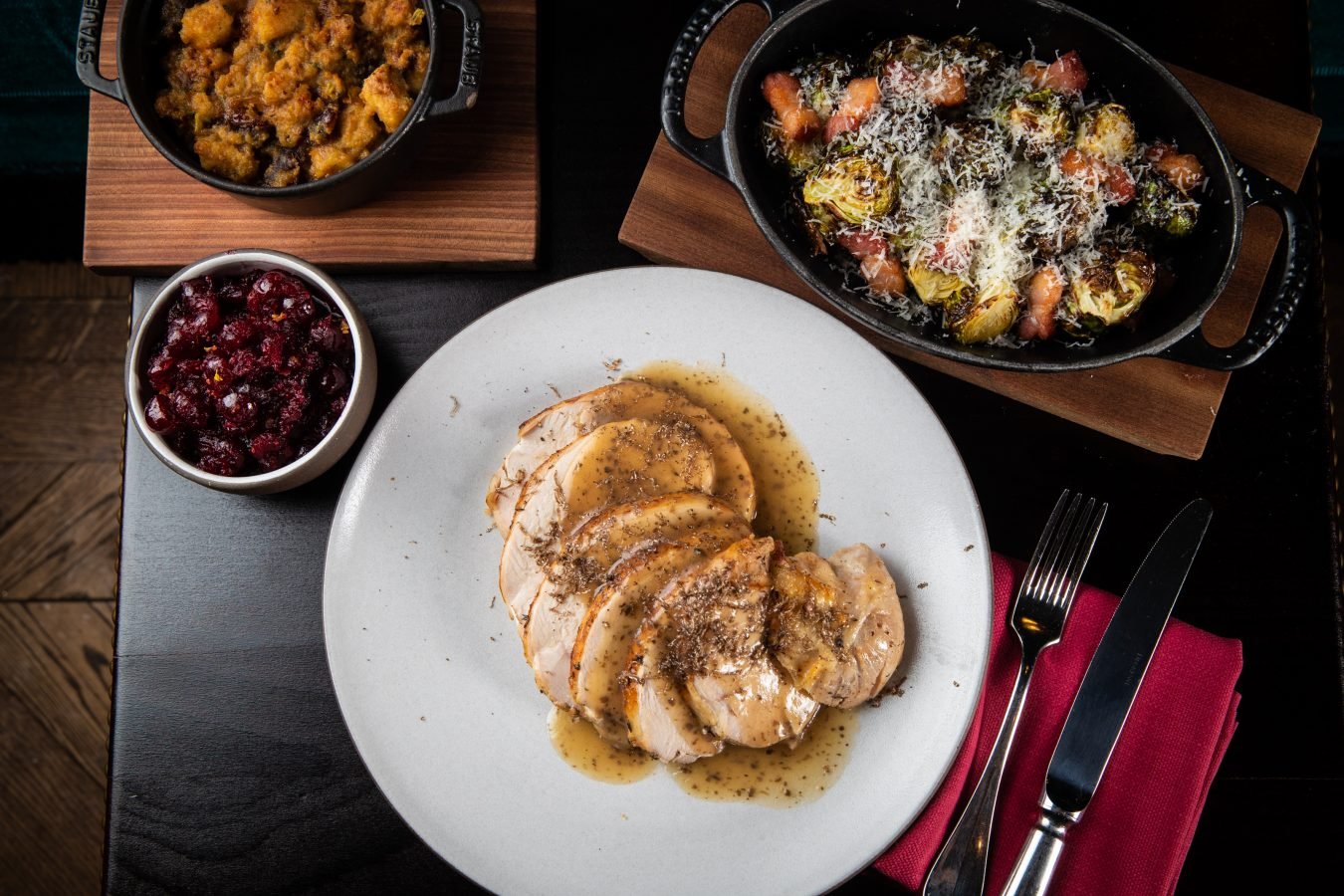 NoMad's Roast Turkey paired with creamy parsnip creamy parsnip ecrasse, delicata squash, chestnut stuffing and a rich black truffle gravy