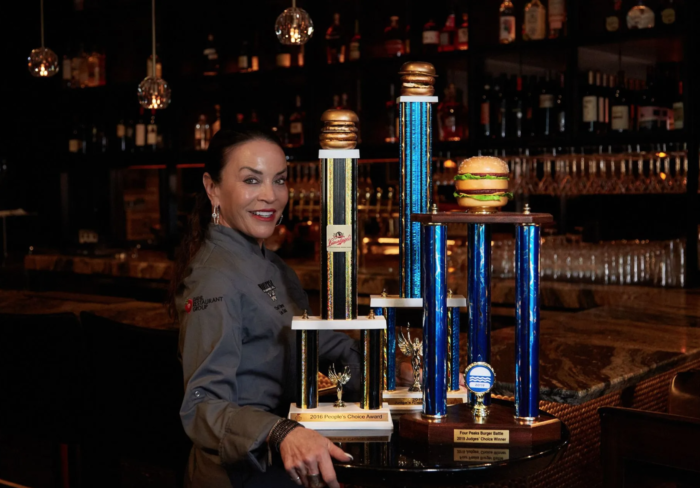 Chef Lisa Dahl with her Burger Battle awards