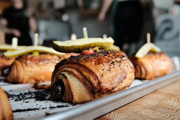 Daisies and Wieners Circle collab on a hot dog croissant. Streeterville Productions