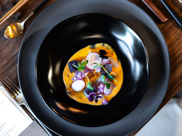 This dish is like an elevated Peruvian ceviche with luxury ingredients like sliced hamachi, blue crab (or uni), caviar, and a red pepper leche de tigre.