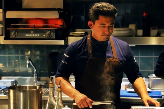 Tohru Nakamura cooking at his two wtarred restaurant in Munich