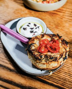 Fugazzeta (Argentine Cheese-Stuffed Bread with Sun-Dried Tomatoes and Whipped Ricotta)