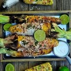Grilled elotes with cotija and lime