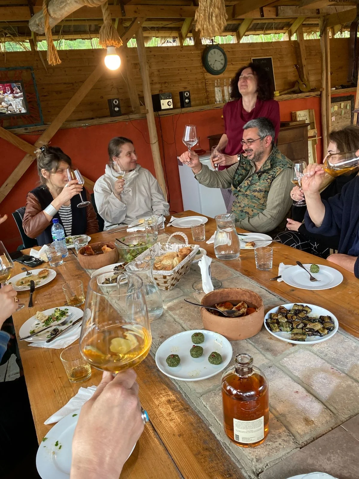 Andro Barnovi making a toast at his Wine Artisans tasting room in Tsedisi